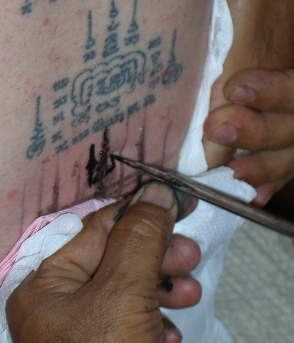 close up view of the sak yant needle known as mai sak or Khem Sak in 